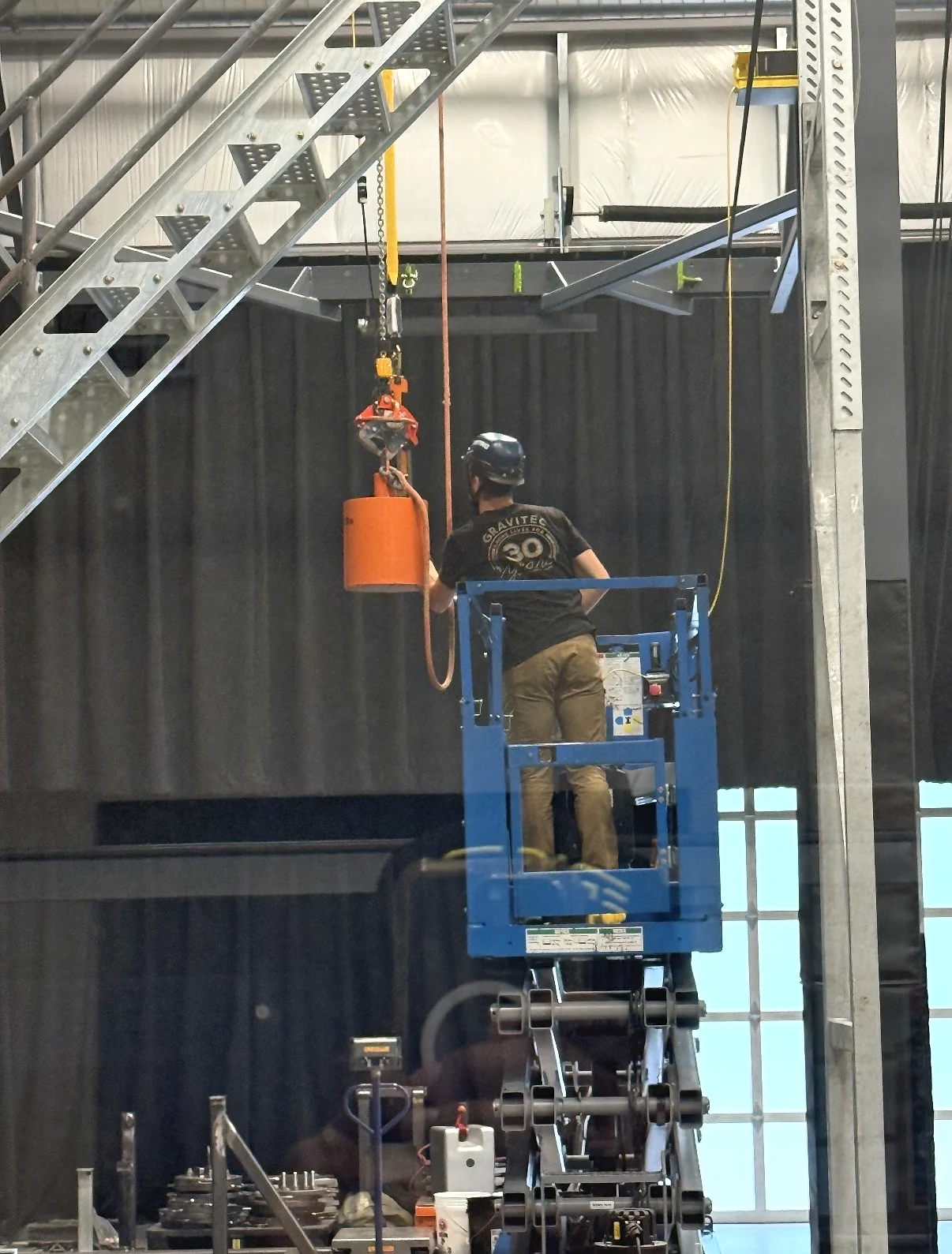 Gravitec Systems professional conducting controlled fall-protection testing using specialized equipment.